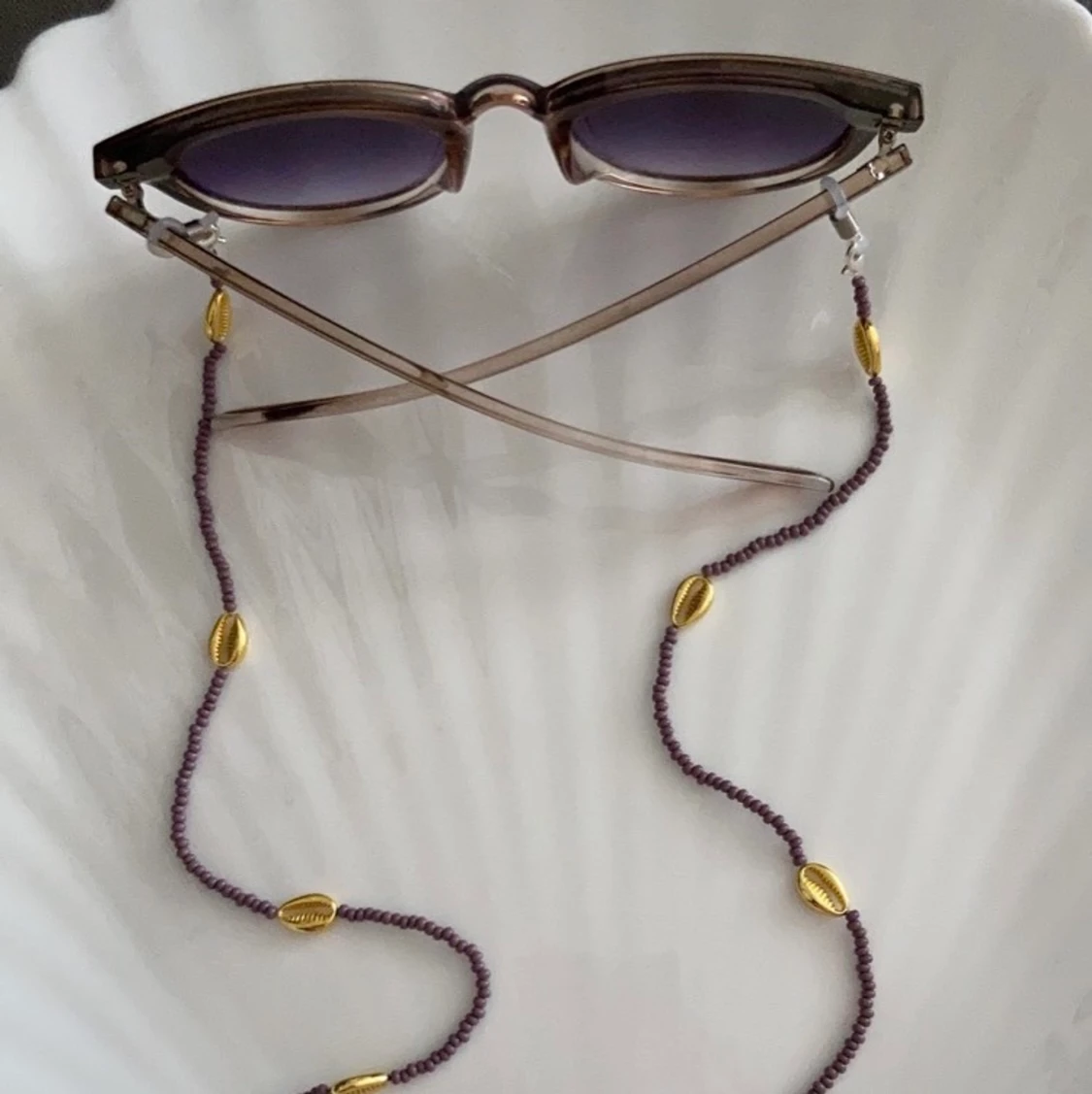 Glasögonkedja snäckor  - 91