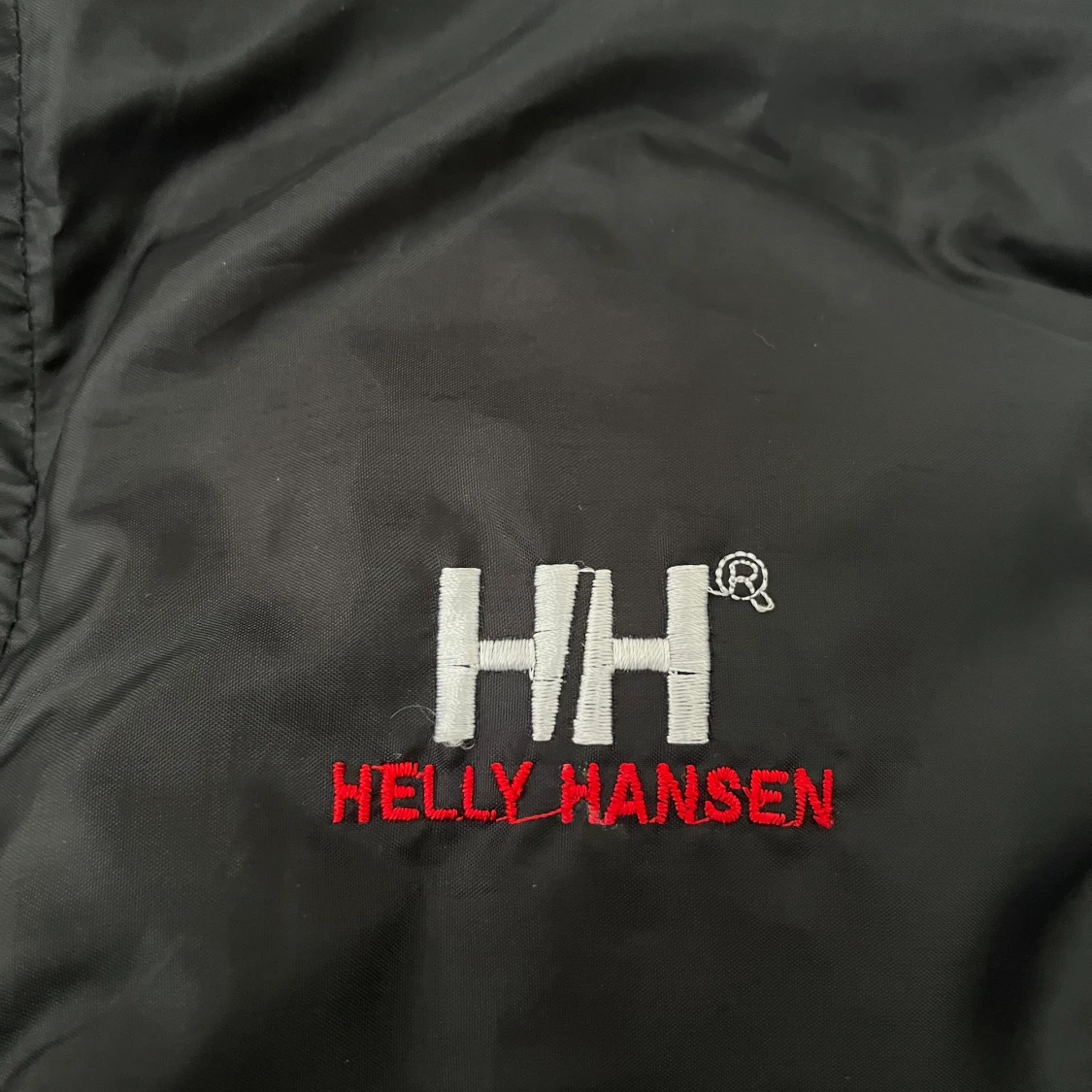Vändbar dunväst från Helly Hansen - 91