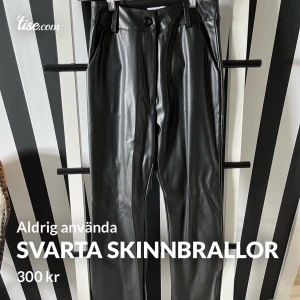 Svarta skinnbrallor  - Oanvända! Storl s