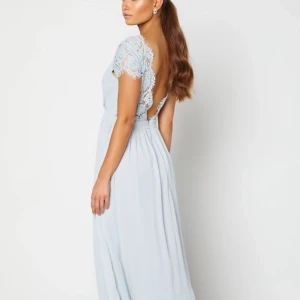 Balklänning storlek 38 - Ljusblå balklänning från Moments i storlek 38 Ej använd så fint skick Skicka meddelande för fler bilder!