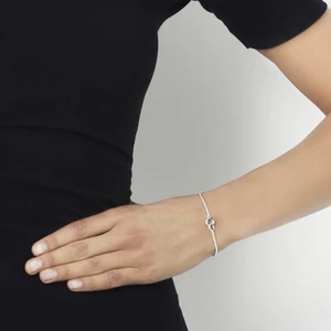 Armband Efva Attling - Två armband från Efva Attling, samt ett armband och ett par örhängen från Edblad.