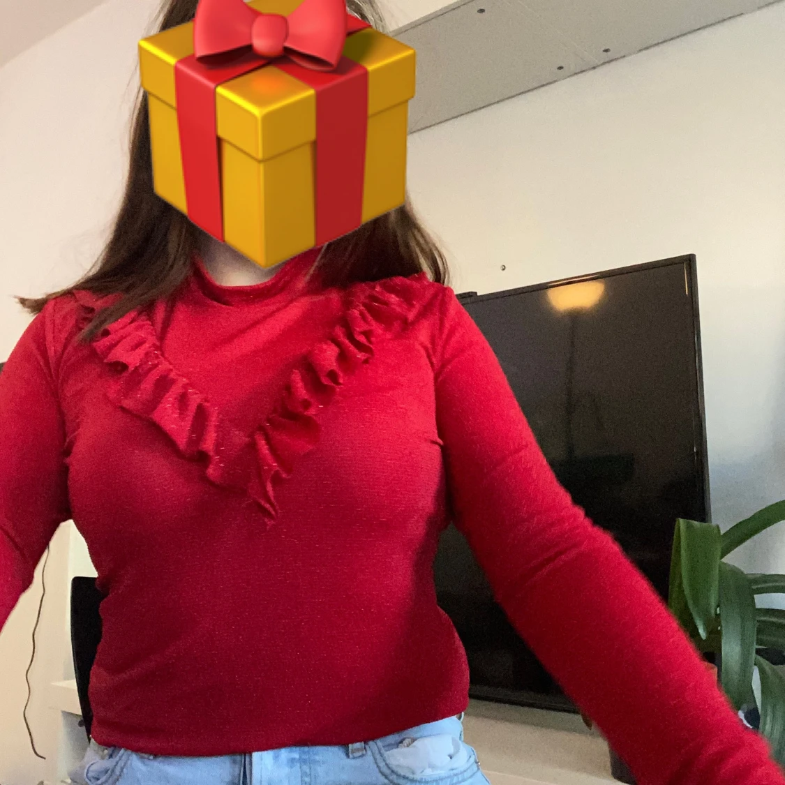 Röd glittrig tröja