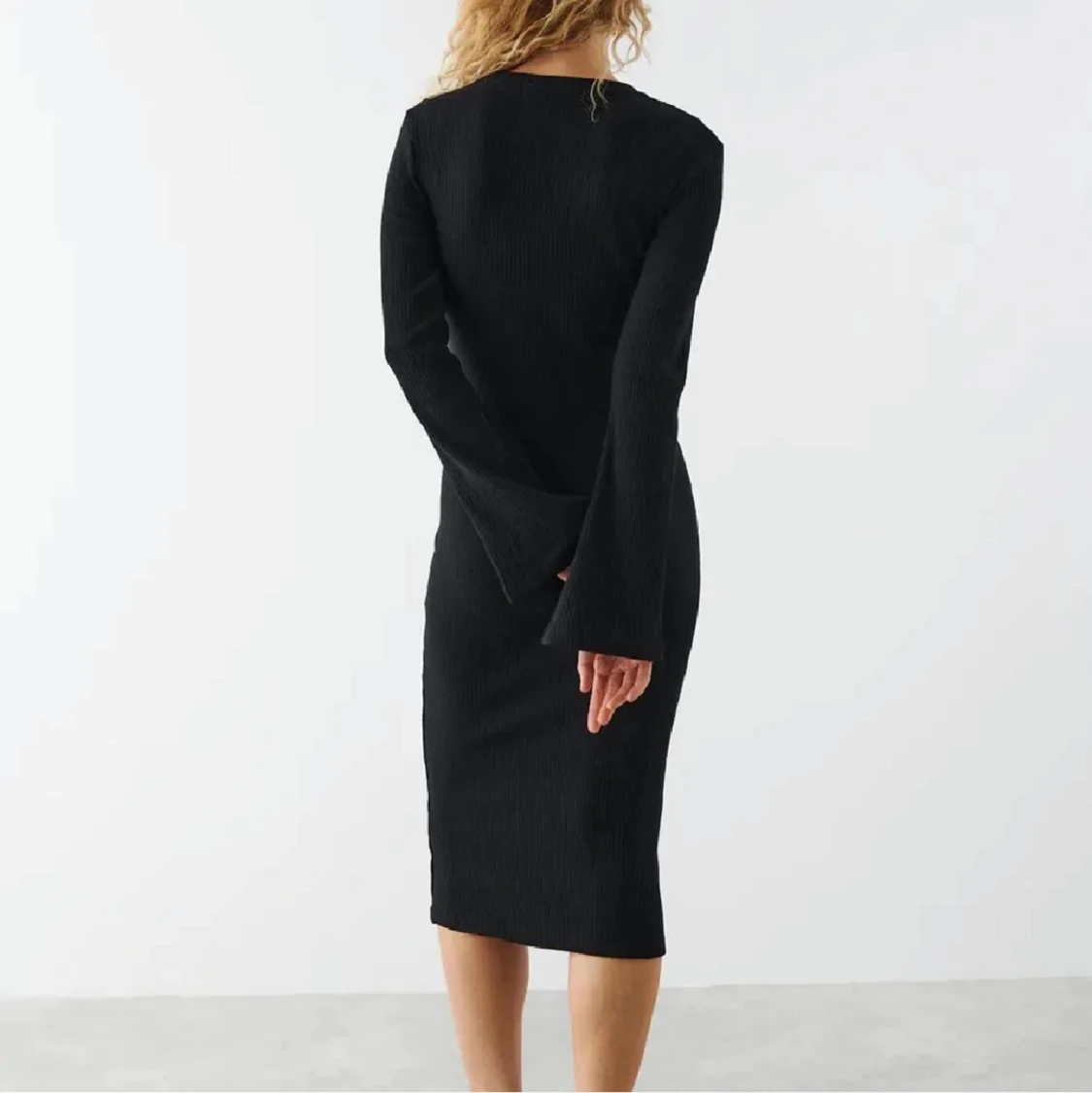 Svart stickad klänning - 90