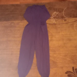 Light purple blue overalls. - The overall is never been worn it's brand new.