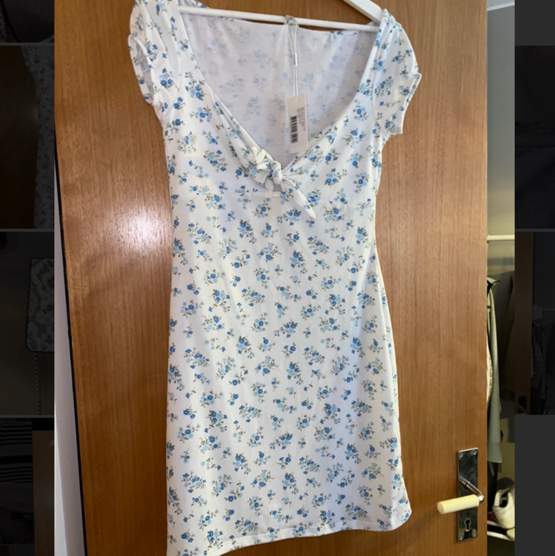 Blommig klänning Nelly - 90