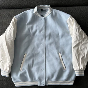 White and blue jacket size S-M - I used it maybe twice, in perfect condition. 