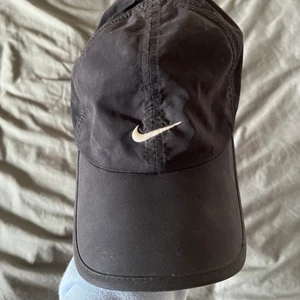 Nike keps - Snygg vintage Nike keps, vet inte om den är äkta. Helt okej skick skulle jag säga
