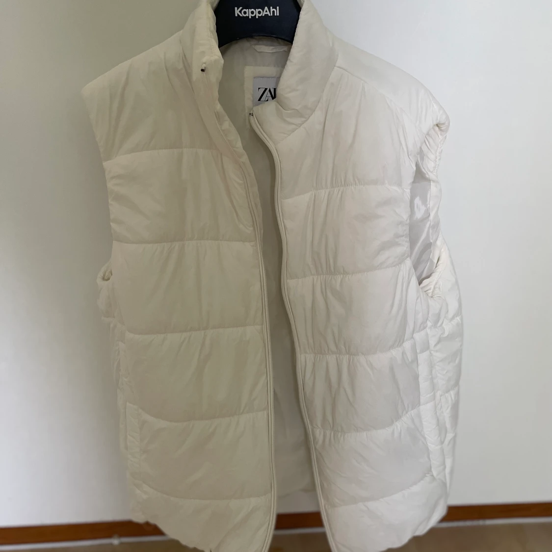 Vit väst - 90