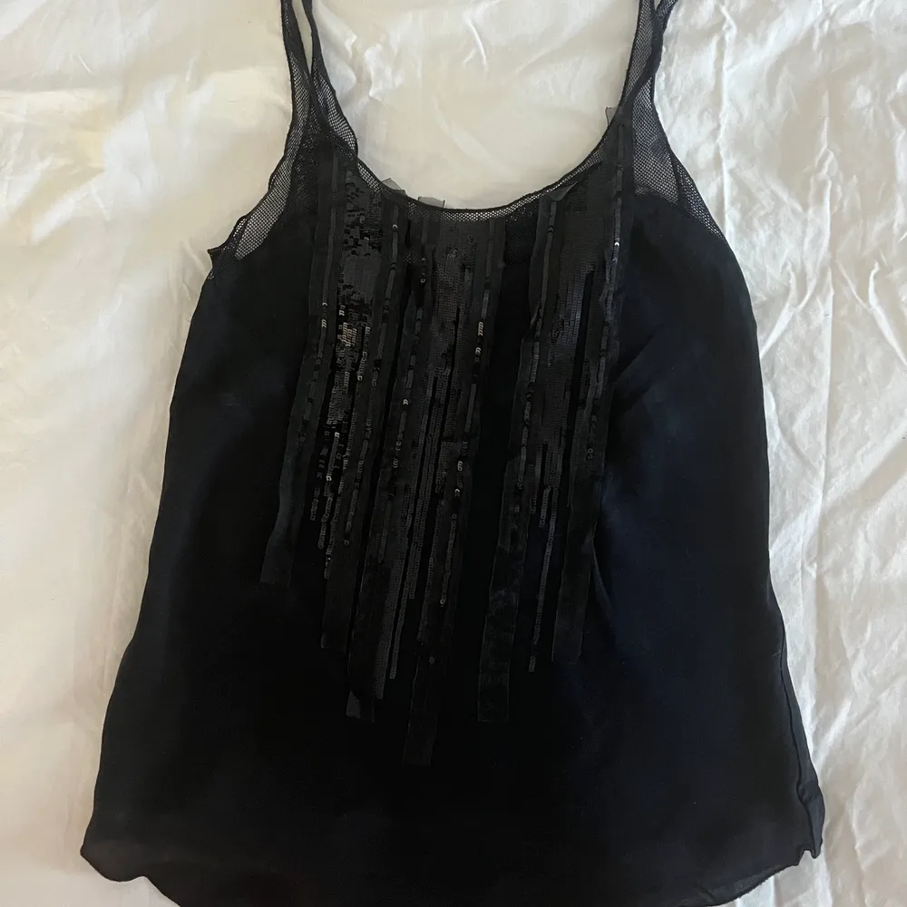 Original Diesel top with sequins and open back. Toppar.