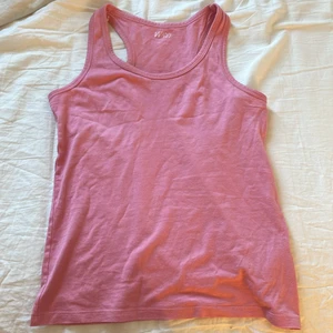 Tröja - Ett rosa linne som inte kommer till andvöndning! Skriv för mer info