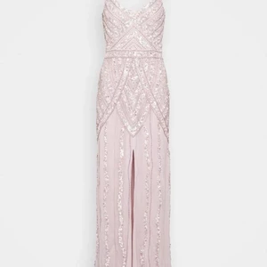 Festklänning - Festklänning till salu. Använd enbart en gång. Vi står för frakt.