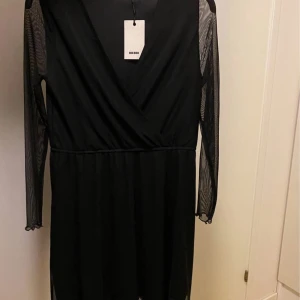 Klänning  - Helt oanvänt 