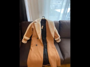 Jacka\kappa - En helt ny oanvänd kappa. 