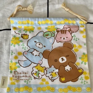 Liten tygpåse med Rilakkuma  - liten tygpåse med Rilakkuma , i nyskick 💓 mått 18x18 cm