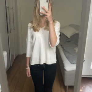 Trekvartsärmad tröja - Beige trekvartsärmad tröja. Strl XS men passar även S