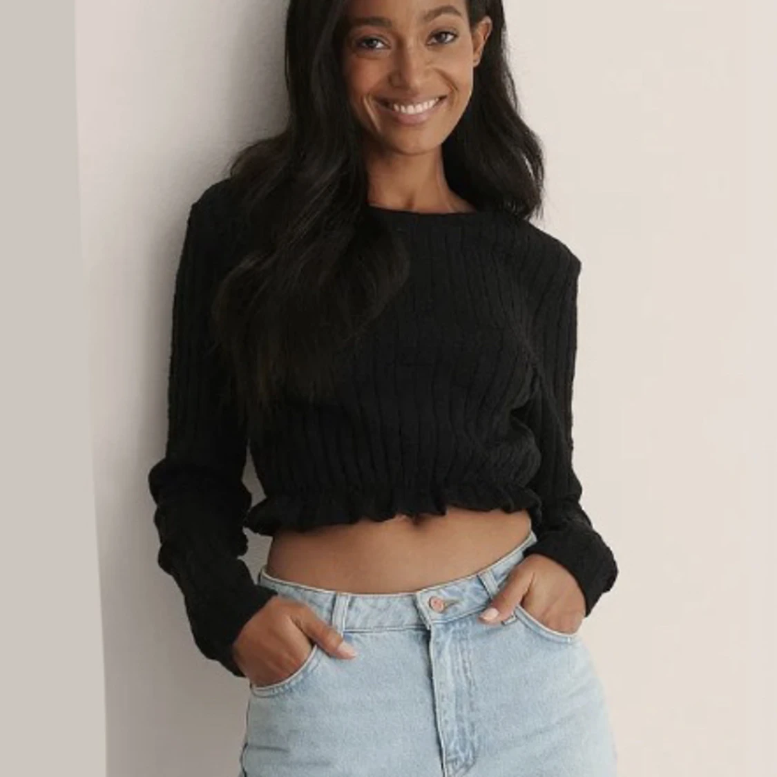 Långärmad stickad tröja