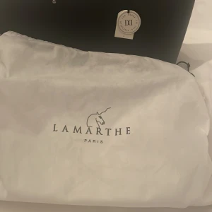lamathe/don donna väska  - säljer denna oanvända väskan