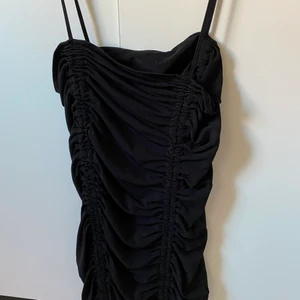 Svart miniklänning från Nakd  - Helt ny, storlek L 