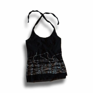 Halterneck topp - Sjukt söt halterneck topp i mesh och med glitterdetaljer. I gott skick! 