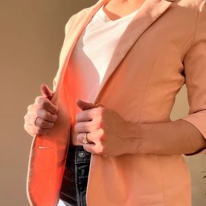 Pink fitted blazer SMALL - Pink blazer, fitted. Bought it in USA. Wore it to go to my job. It has two buttons in the front and arms are 3/4. The inside needs to be sewed but it is not visible and it is an easy fix. Selling it cheaper than the other blazers so you can fix it.