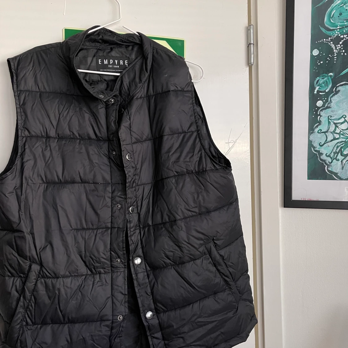 Svart tunn puffer-vest