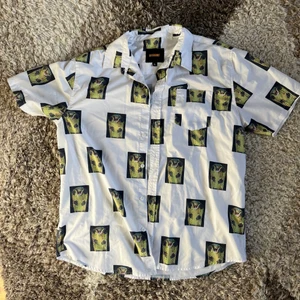 skjorta med ormprint - Köpt på caliroots för kanske 2 år sen. knappt använd, väldigt fint skick