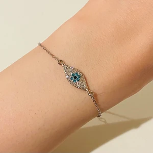 Silver armband Onda ögat 🧿 Evil eye - Evil eye 🧿 Onda ögat jätte fint silver armband 🧿 Längden varierar mellan 16 och 21 cm. 