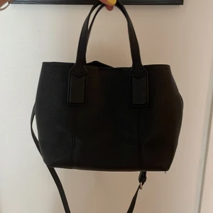 Black bag - Mango black bag. With long strap that is removable. One pocket inside the bag. Black leather with gold details.