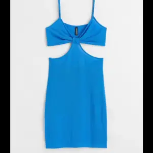 Blå cutout klänning från H&M. Aldrig använd