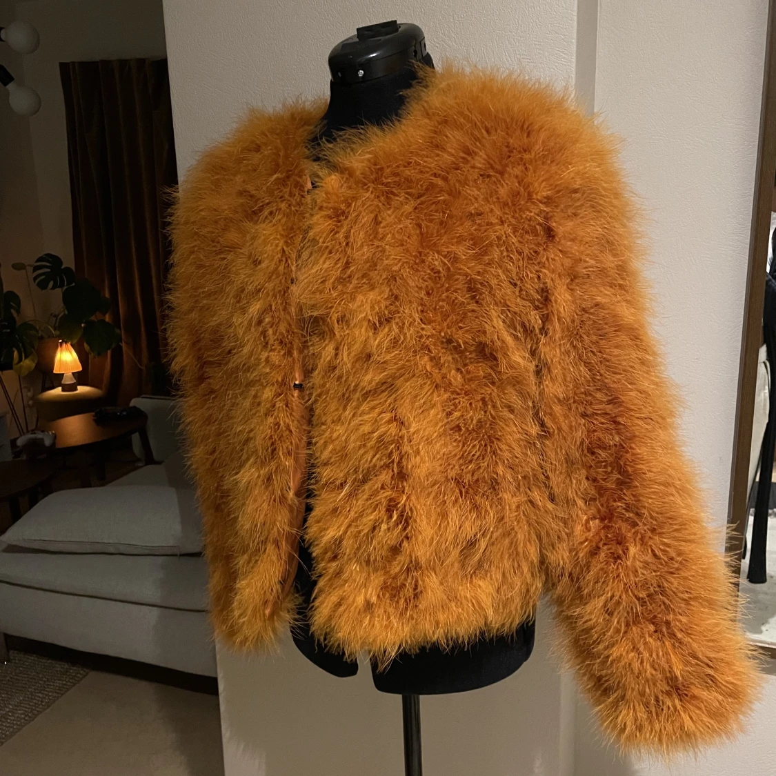 Pälsjacka (fjädrar) 