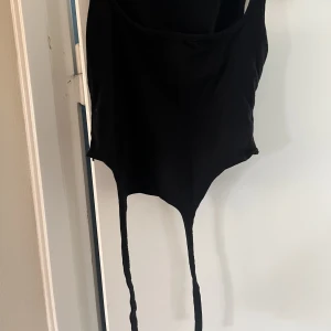Prettylittlething Top - Svart Topp från plt som använts 1 gång. 