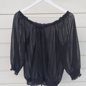 Black Blouse - I really like this black blouse, it's not my style anymore but it's super comfortable and great for layering!