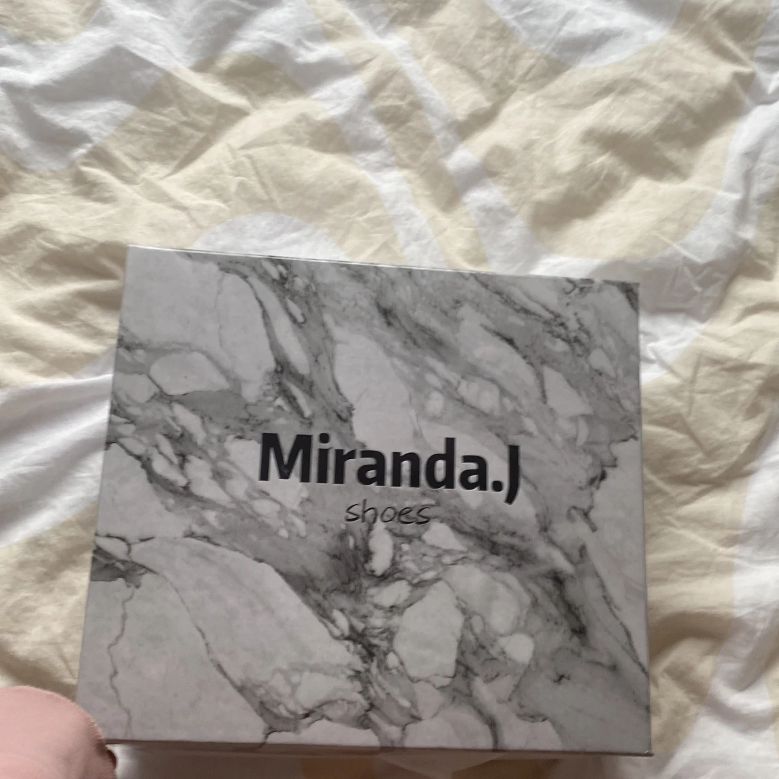 Miranda J, high booots