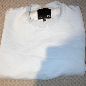 Sweatshirt  - En fin ljusblå hoodie från lager 157 i storlek xs/s