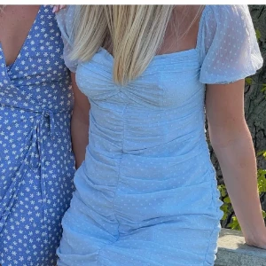 Klänning storlek 34 - Aldrig använd, prislapp sitter kvar.  