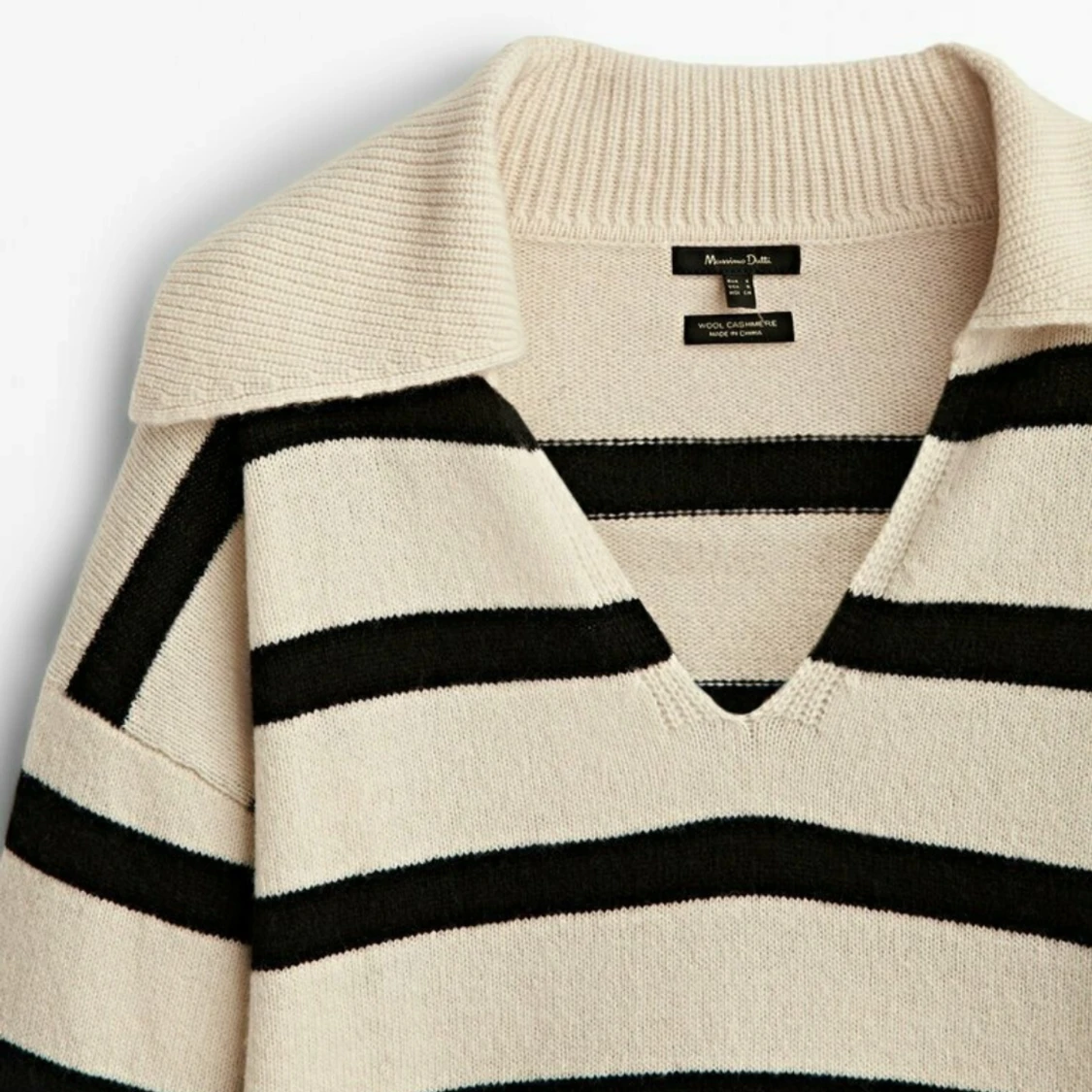 Randig stickad tröja från Massimo Dutti.  - 91