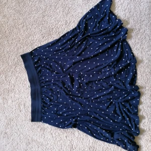 Polka dot skirt - A-line polka dot skirt. Elasticated waist. Can be worn from people wearing S to L. 