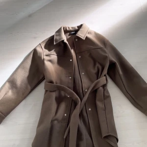 Grön kappa strl xs - Grön kappa använt fåtals gånger, bra skick.