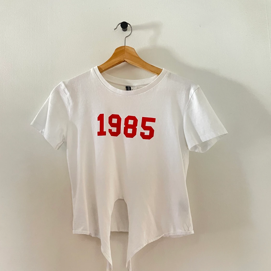 Hm top med tryck och knyte