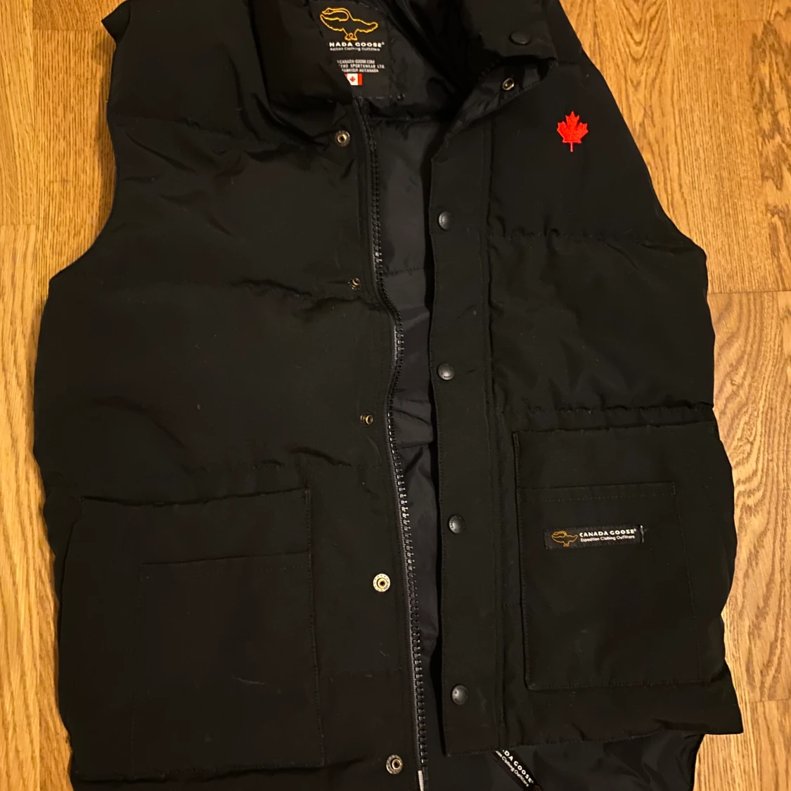 Svart canada goose väst 