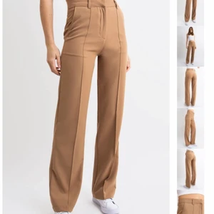 kostymbyxor - oanvända kostumbyxor från madlady i stlk XS-L32