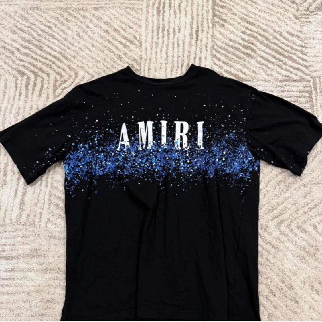 Svart Amiri t-shirt med blått stänkmönster
