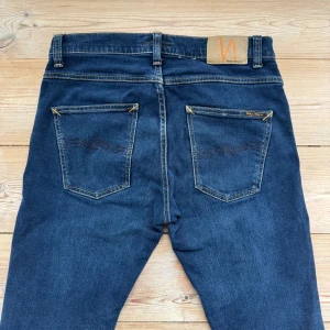 Nudie Jeans - Nudie Jeans (Grim Tim) | Size: W31 L34 | Skick: 8,5/10, inga tydliga defekter | Hör av dig vid frågor och funderingar | Vänliga hälsningar!