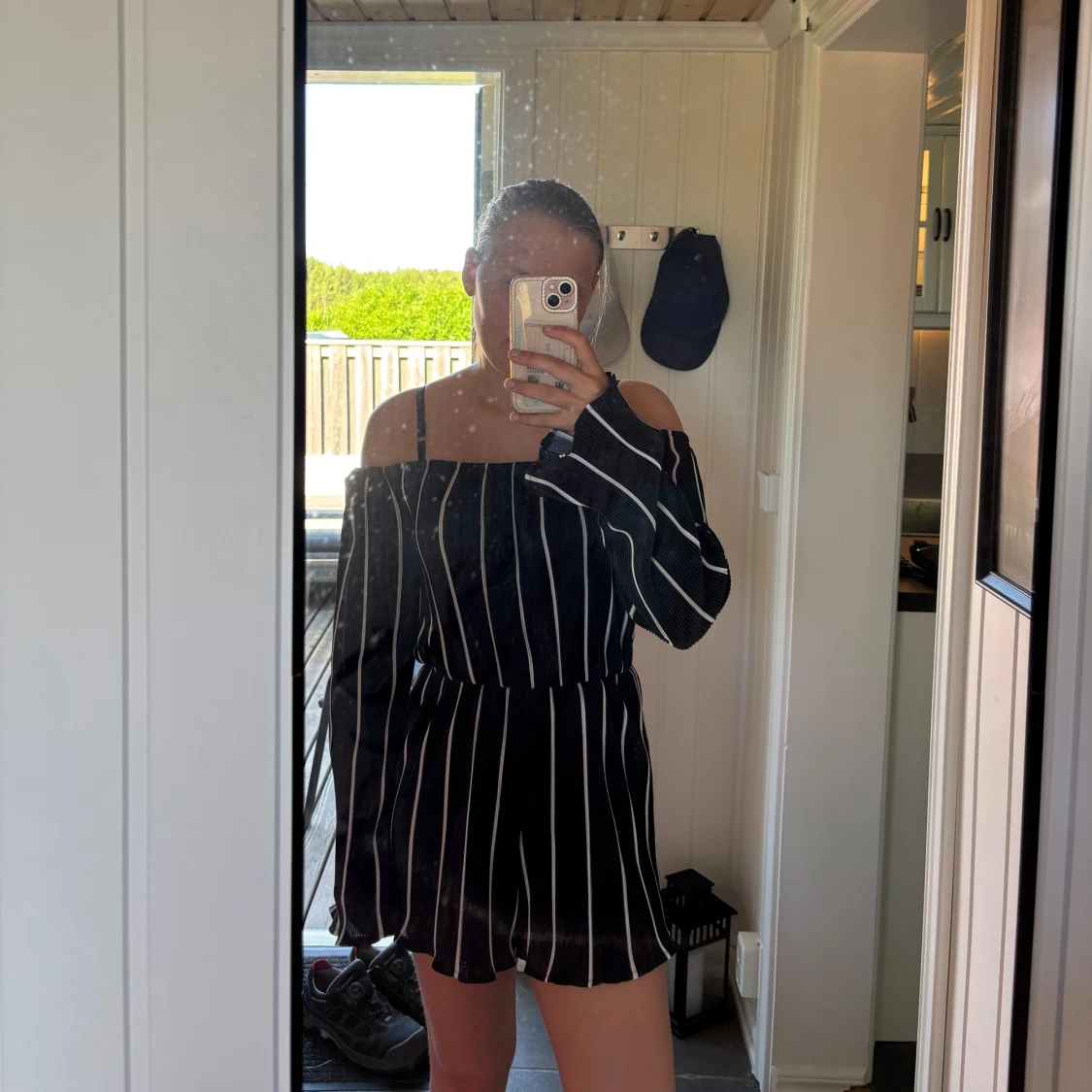 Marinblå randig offshoulder jumpsuit