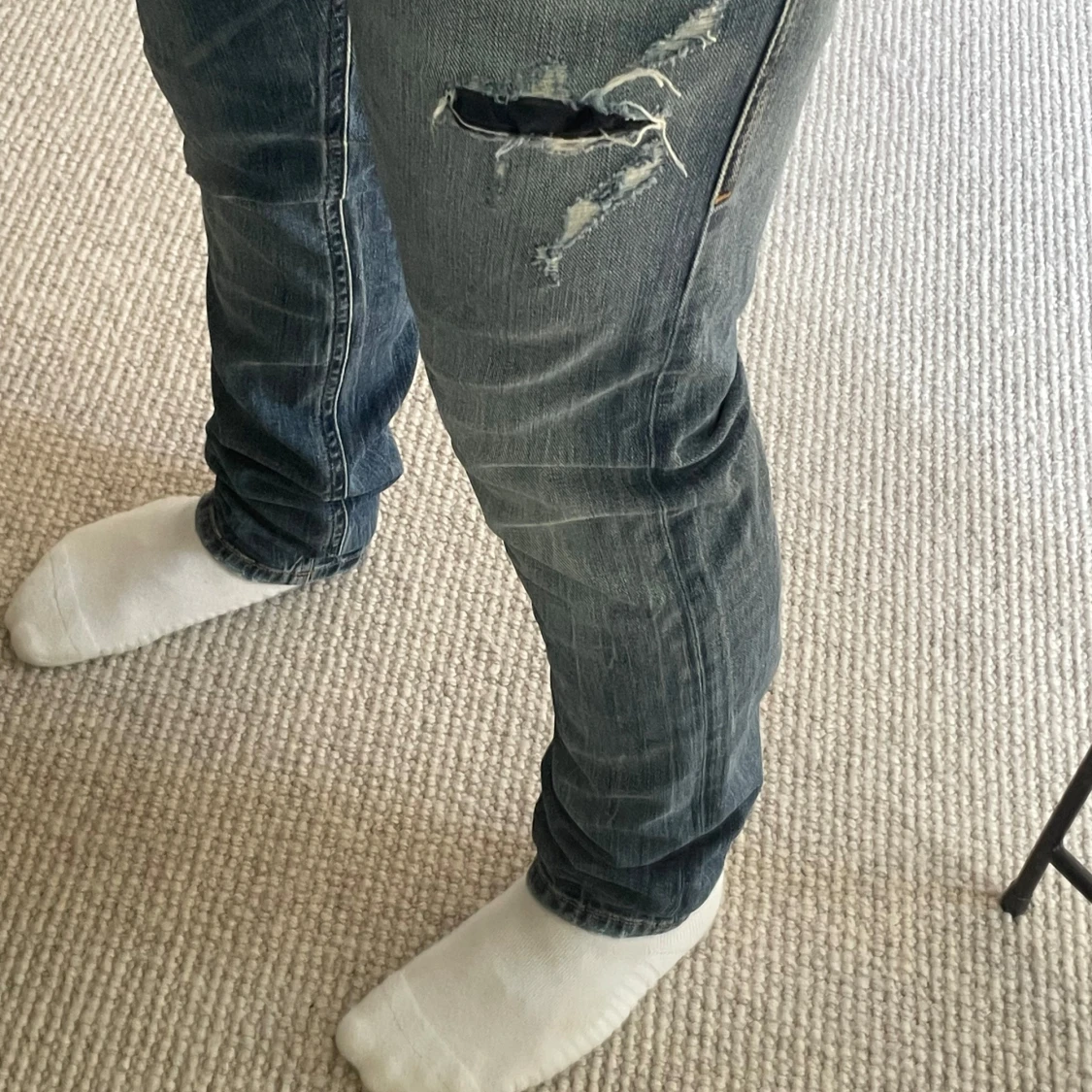 Blå slitna jeans från Diesel - 1