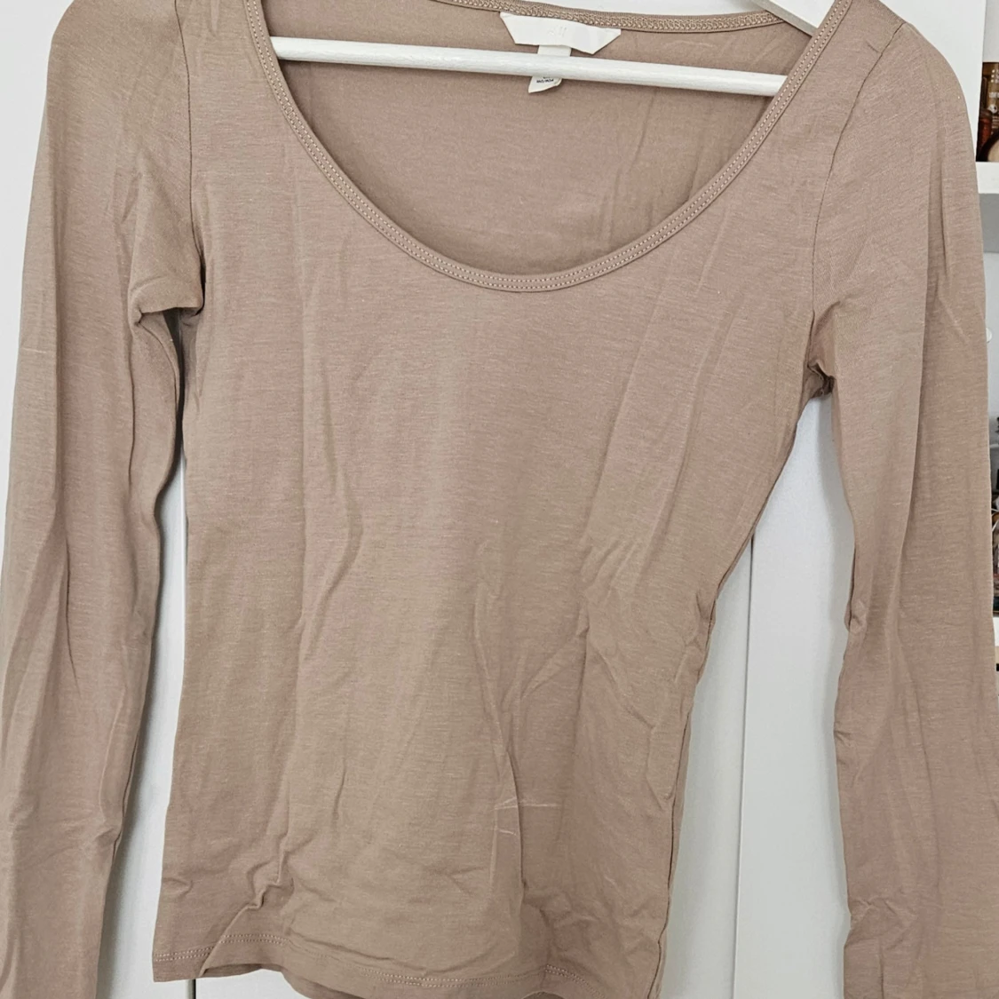 Beige långärmad topp med rund hals