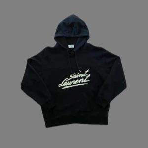 Svart Saint Laurent hoodie  - Saint Laurent hoddie i my ket bra skick, en mycket populär hoddie för ett mycket bra pris, storlek M hör av er vid frågor