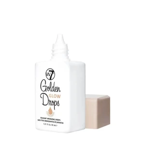 W7 Golden Glow Drops bronzer - W7 Golden Glow Drops är flytande bronzerdroppar som ger huden en solkysst, gyllene lyster. Kommer i en vit plastflaska med beige skruvlock och smidig pipett för enkel applicering. Perfekt för att blanda i foundation eller använda direkt på huden för extra glow. 