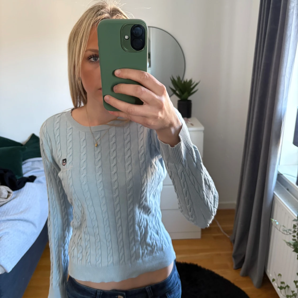 Ljusblå stickad tröja från Bondelid