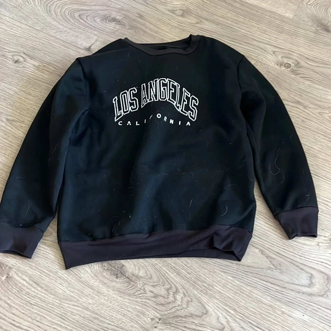 Svart sweatshirt Los Angeles tryck